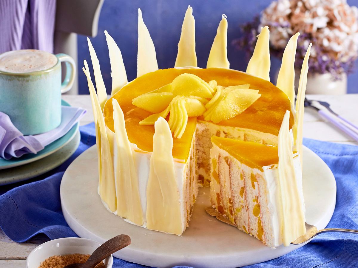 Sonnige Käsesahne-Torte mit Mango Rezept