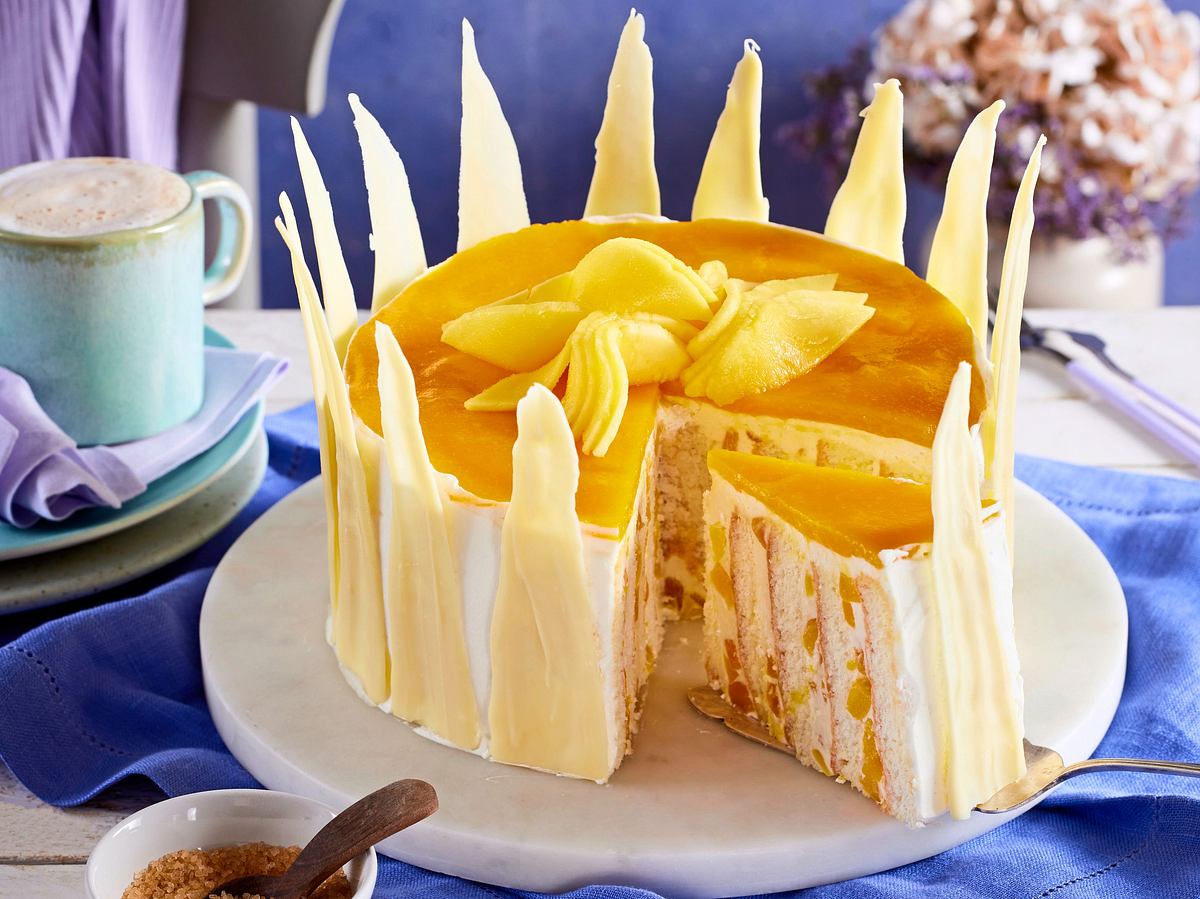 Sonnige Käsesahne-Torte mit Mango Rezept