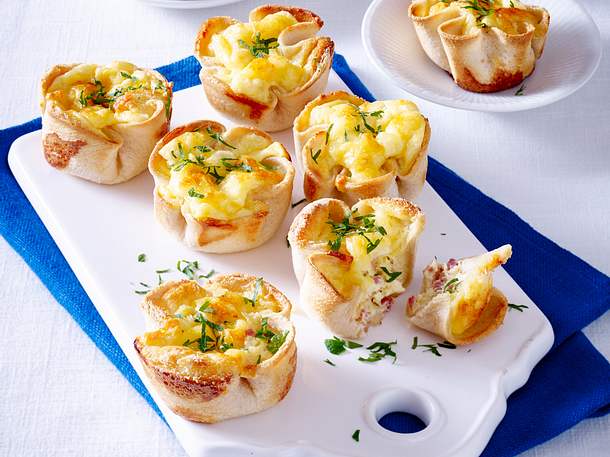 Toastmuffins mit Käse-Schinken-Füllung Rezept Toastmuffins mit Käse-Schinken-Füllung Rezept