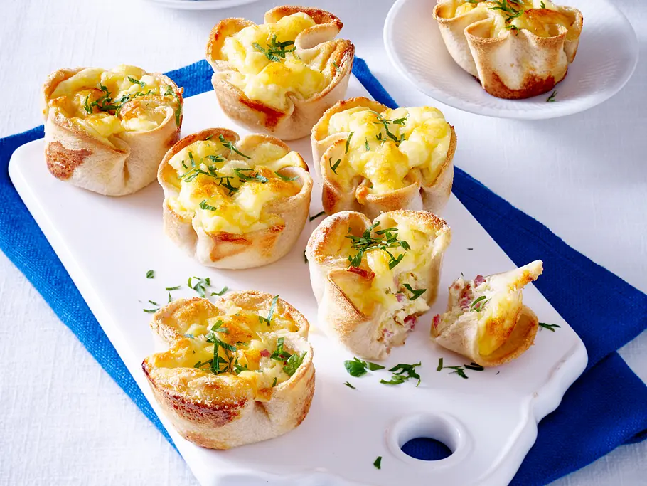 Toastmuffins mit Käse-Schinken-Füllung Rezept Toastmuffins mit Käse-Schinken-Füllung Rezept