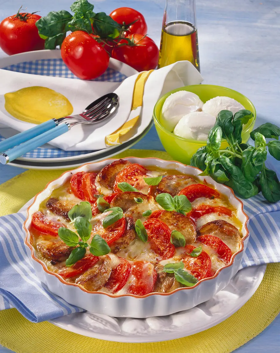 Tomate-Mozzarella-Gratin mit Schweinemedaillons Rezept Tomate-Mozzarella-Gratin mit Schweinemedaillons Rezept