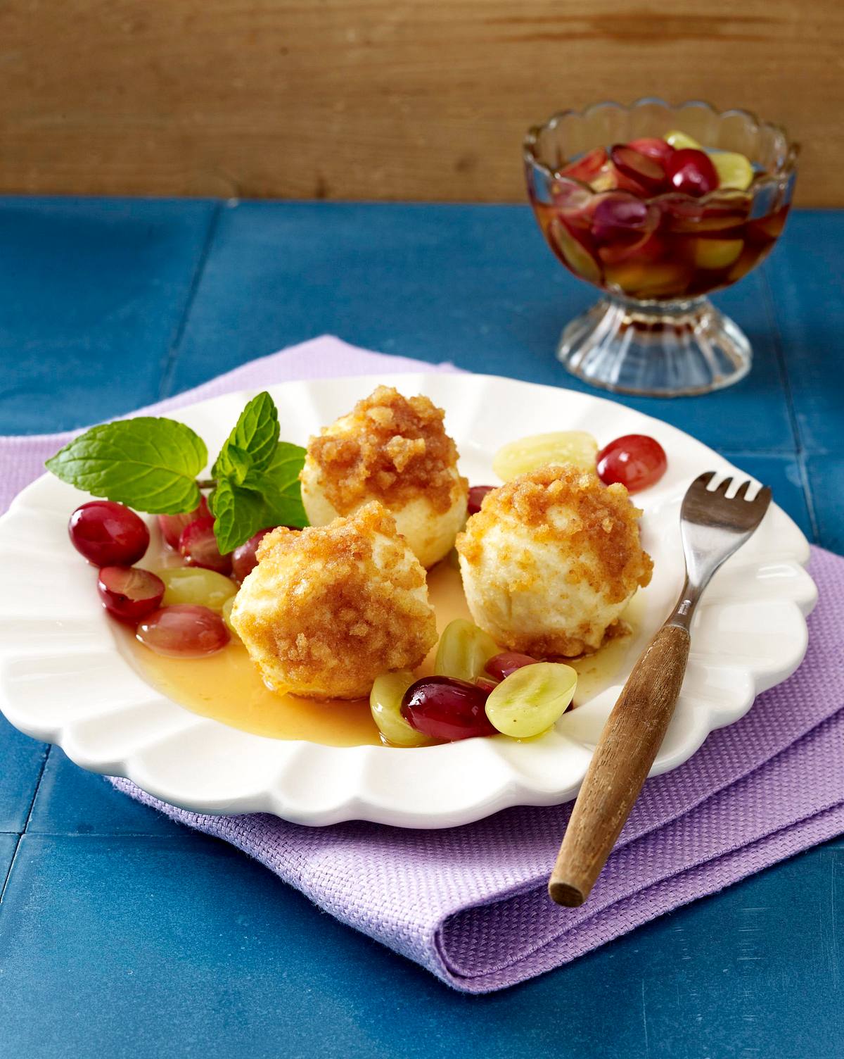 Topfenknödel mit geschmolzenen Weintrauben Rezept