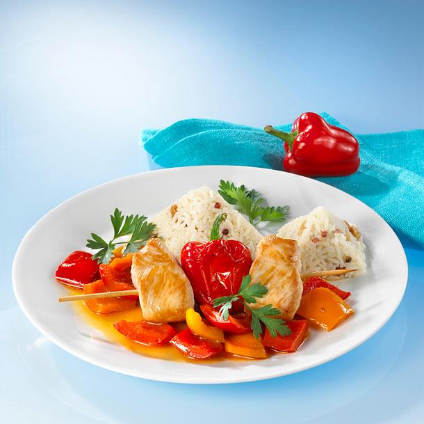Truthahnbrust mit buntem Paprikagemüse und Reis Rezept