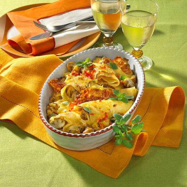 Überbackene Pfannkuchen mit Champignons Rezept