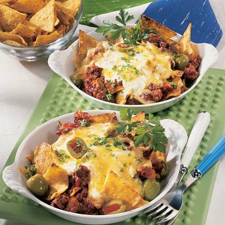 Überbackene Tortilla-Pfännchen mit Hacksoße Rezept Überbackene Tortilla-Pfännchen mit Hacksoße Rezept