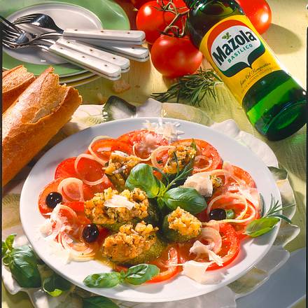 Überbackene Zucchini auf Tomatenbett Rezept