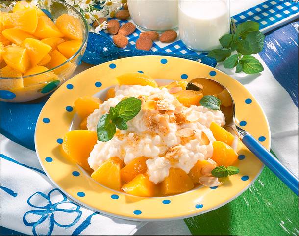 Vanille-Milchreis mit Mandelbutter und Pfirsichen Rezept Vanille-Milchreis mit Mandelbutter und Pfirsichen Rezept