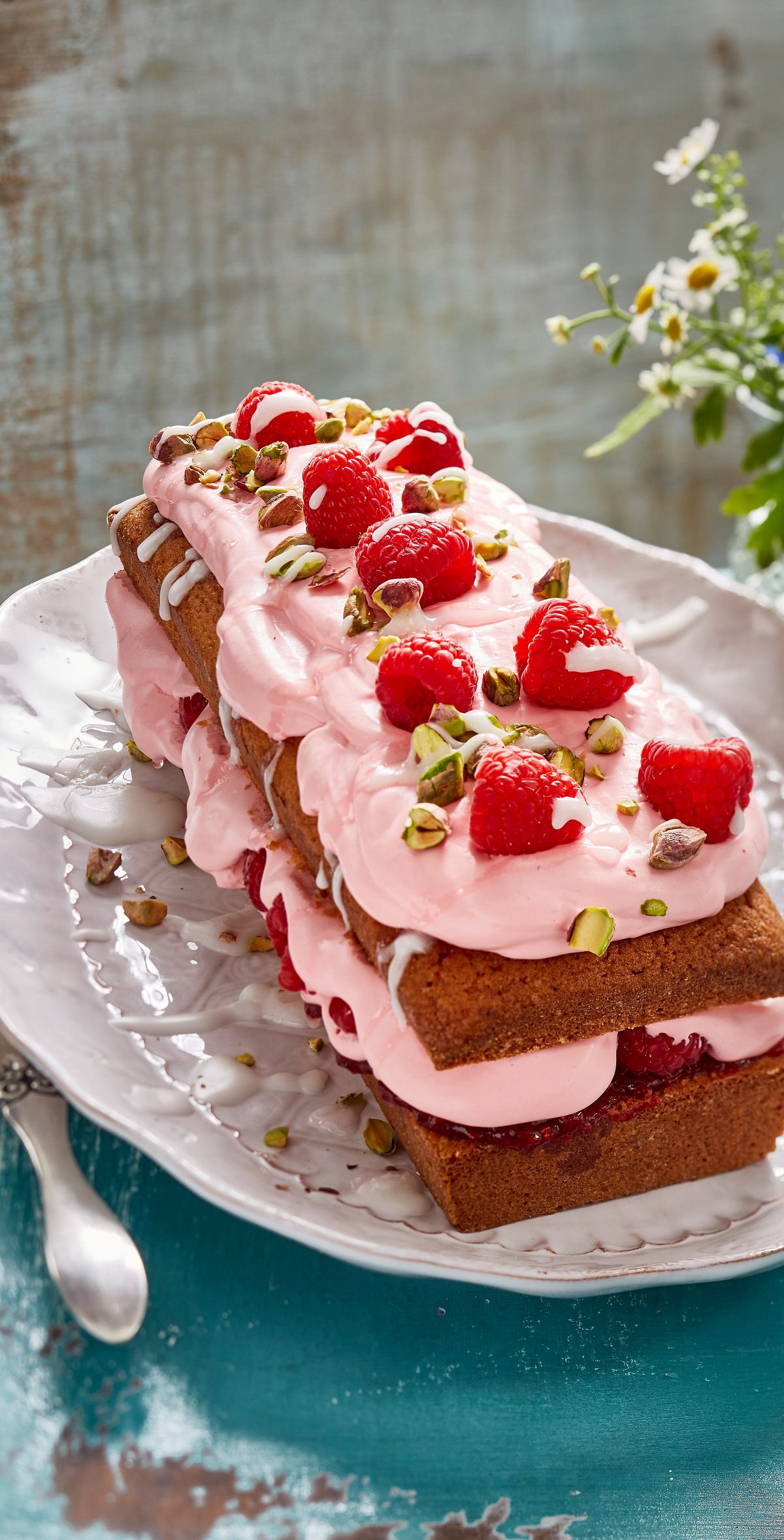 Zitronen-Mascarpone-Kuchen mit Himbeeren Rezept